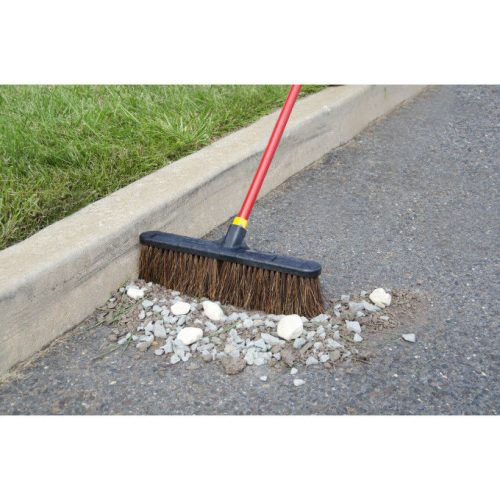 18" stable broom in use